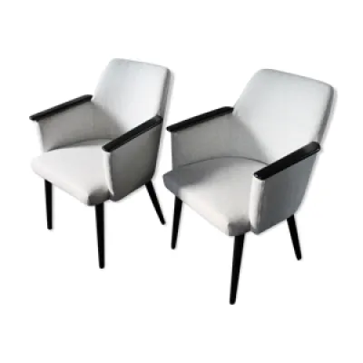 A pair of armchairs,