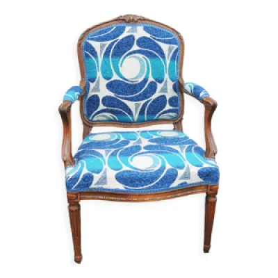 Ancien fauteuil tapissé - style