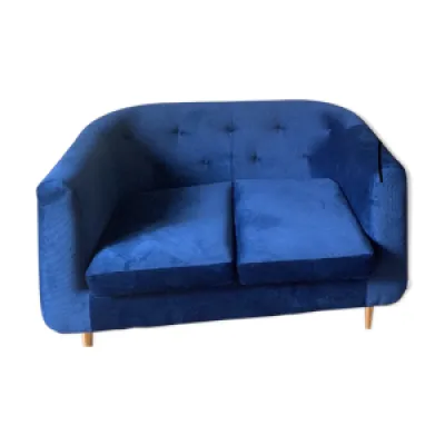 Canapé en velours bleu