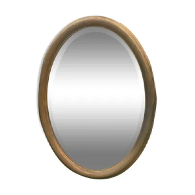 miroir ovale doré biseauté,