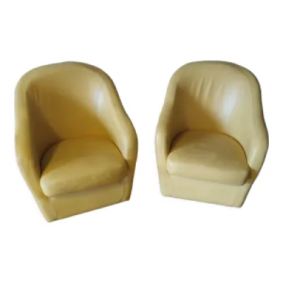 Deux fauteuils club en - cuir jaune