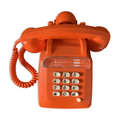 Téléphone vintage orange à touches
