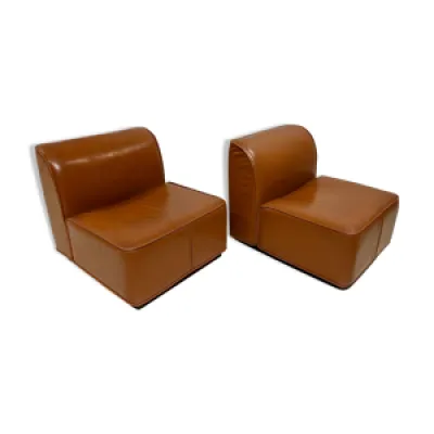 Paire de fauteuils en - cuir couleur