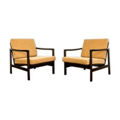 Paire de fauteuils orange - 1960