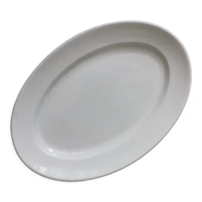 Plat ovale blanc en terre - fer