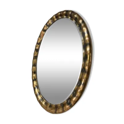 miroir ovale doré