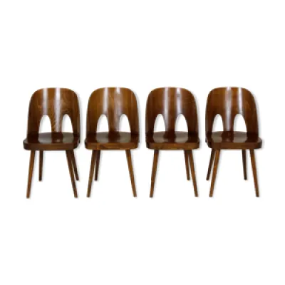 chaises en bois par Oswald - 1950