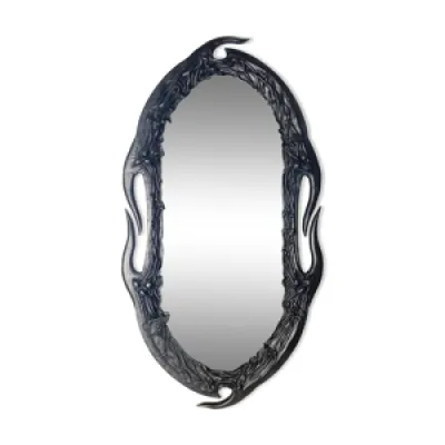 miroir ondulé enveloppé