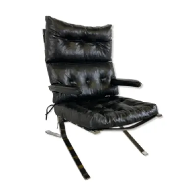 fauteuil en cuir noir - 1970 milieu