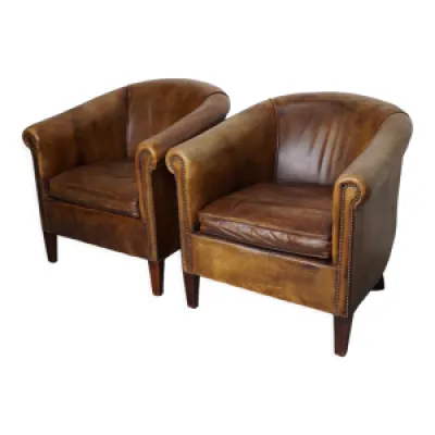 2 fauteuils club en cuir - couleur marron