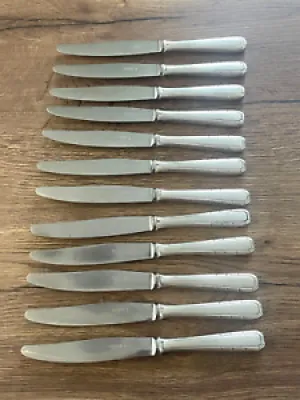 12 anciens couteaux à - alfenide