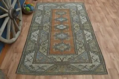 5.4x8.4 ft,BORDERED MILAS - wool rug
