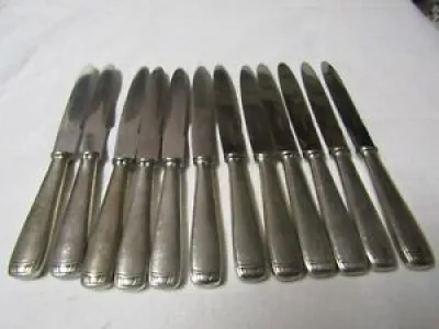 Lot de 12 couteaux en - ercuis