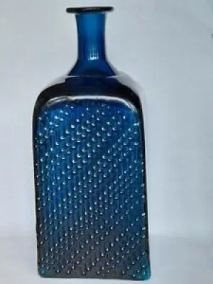 Petrol-blue Flindari - designed