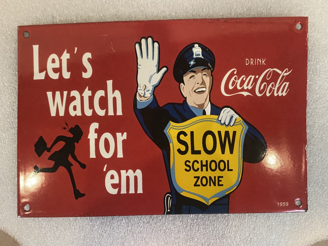 Pancarte « Slow school zone » – Coca-Cola x trafic Cop