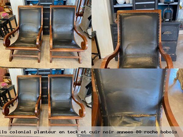 Paire de fauteuils colonial planteur en teck et cuir noir annees 80 roche bobois